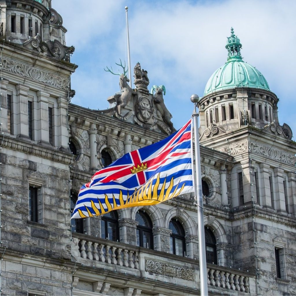BC flag in front of Legislative Assembly